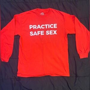 Red Long sleeve Graphic “practice safe seggs”
